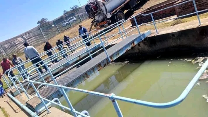 Suction hose running into a pump station chamber