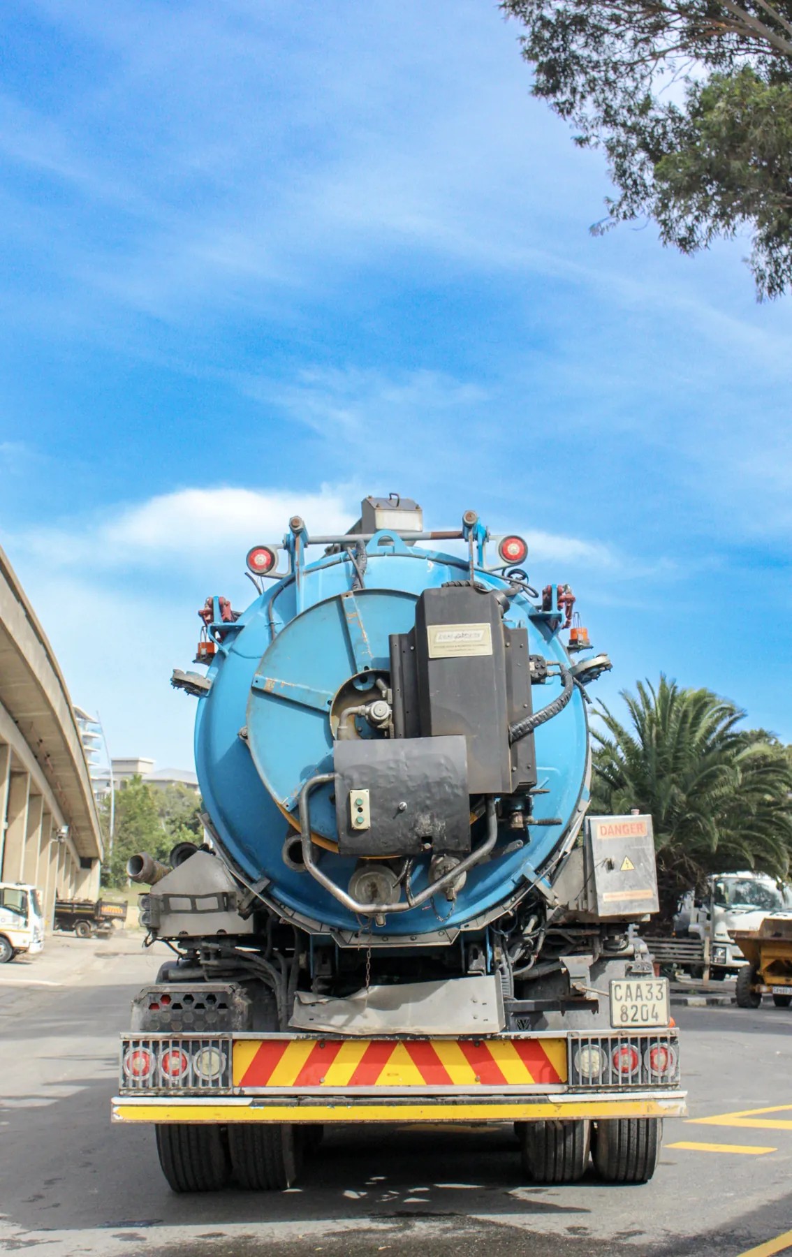 Rear of a combination truck showing the hose reel